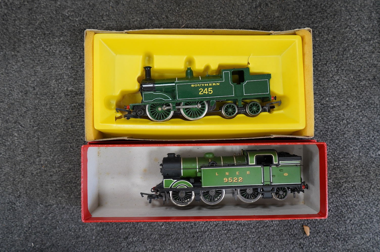 A collection of boxed 00 gauge railway, mainly by Tri-ang Hornby, including six locomotives (one unboxed), together with twenty-five freight wagons. Condition - good.